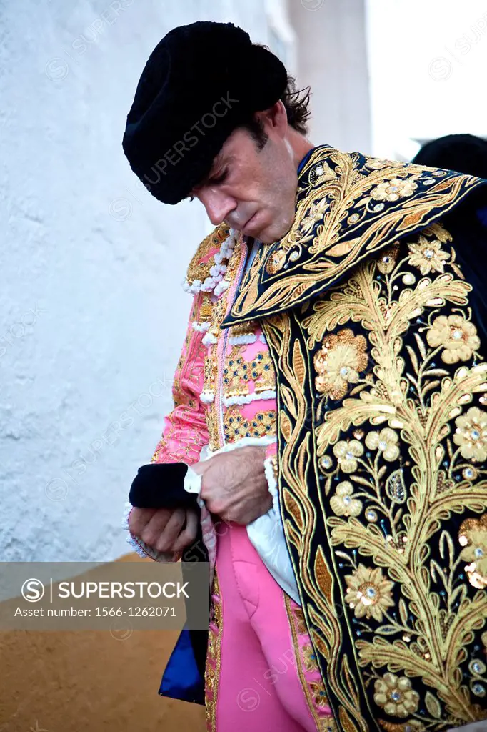 The spanish bullfigher Jose Tomas getting dressed for the paseillo or initial parade Taken at Linares bullring before a bullfight, Linares, Spain, 29 ...
