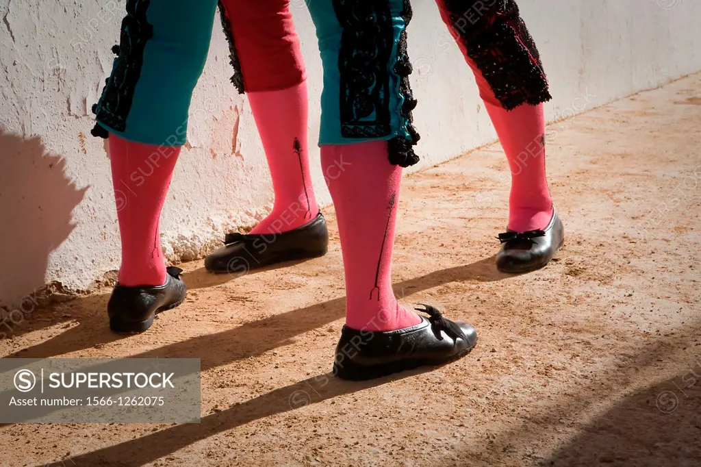 Legs of bullfighters waiting in the patio de cuadrillas, Jaen, Spain