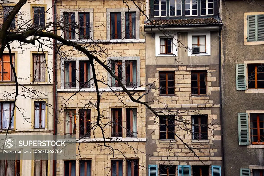 historic residential buildings next to city square Place du Bourg-de-Four in the old town of Geneva, Switzerland