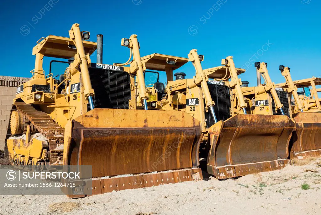 Laughlin, Nevada - March1: Caterpillar D10N track-type tractors and scrapers sit idle 4-1/2 years after the housing and construction market collapse a...
