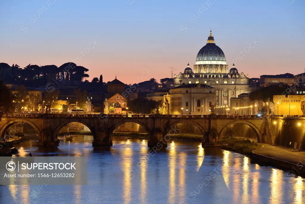 Rome. Italy. View of St Peter´s Basilica, the river Tiber & Ponte Sant´ Angelo.