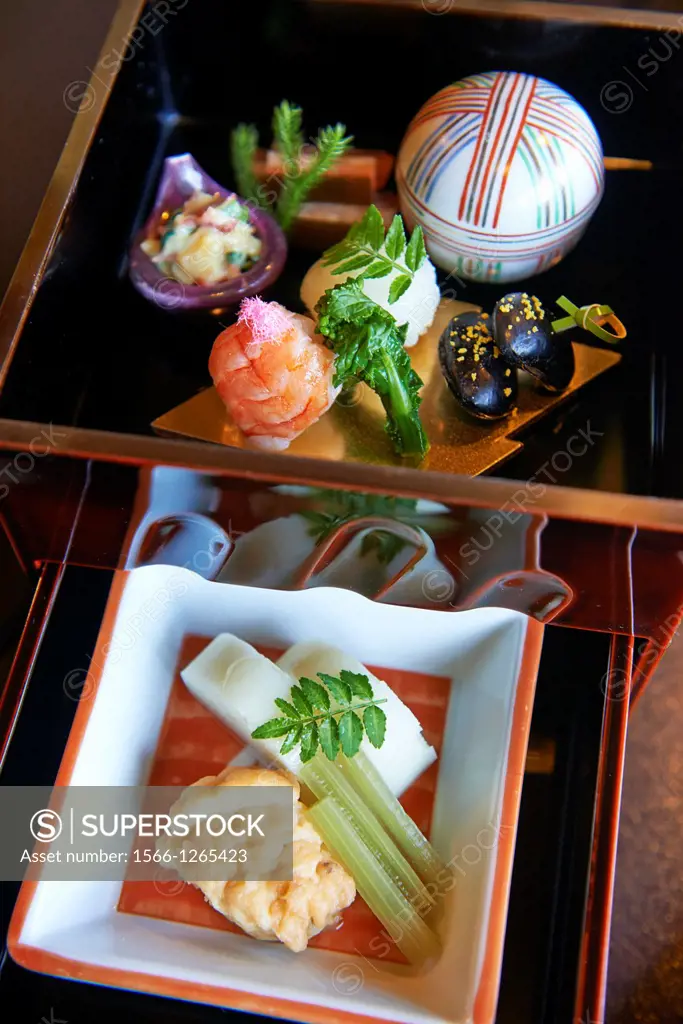 Traditional Japanese ryokan food served in small dishes