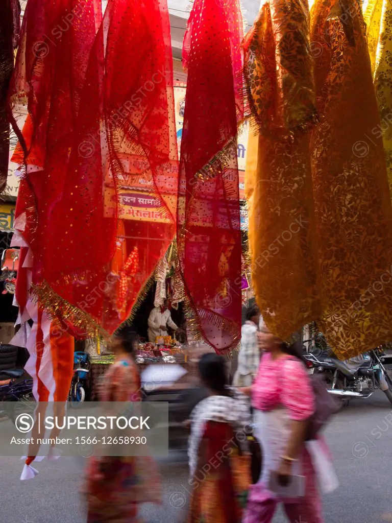 Traditional clothing hanging on shop in Udaipur, Rajasthan, India