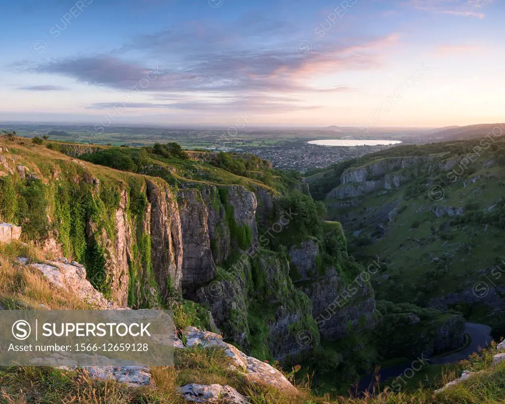 Summer evening view from Cheddar Gorge in the Mendip Hills towards Cheddar Reservoir, Somerset, England.