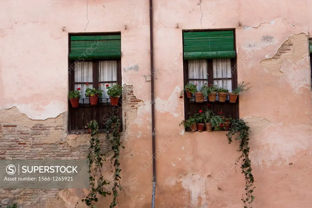 Coquettish window in a corner of the Albaicn neighborhood  Granada  Spain