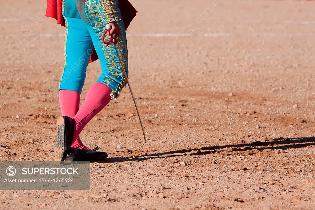 Bullfighting walking on the sand with his sword, Spain