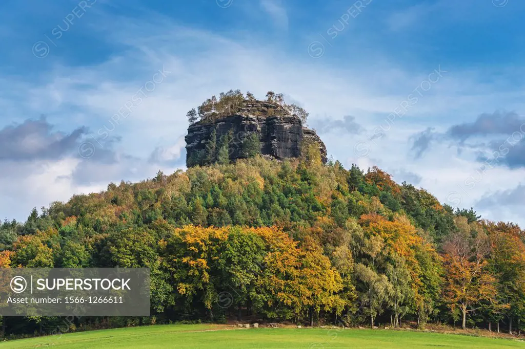 View to the Zirkelstein rock. The Zirkelstein is the smallest table mountain in the national park Saxon Switzerland. It is a wooded, cone-shaped hill ...