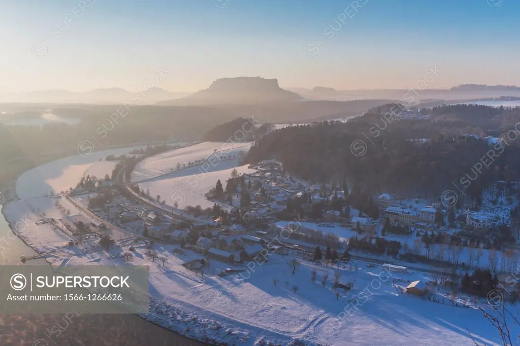 View from the spectacular rock formation Bastei (Bastion) in the national park Saxony Switzerland to the health resort Rathen and to Elbe River near D...