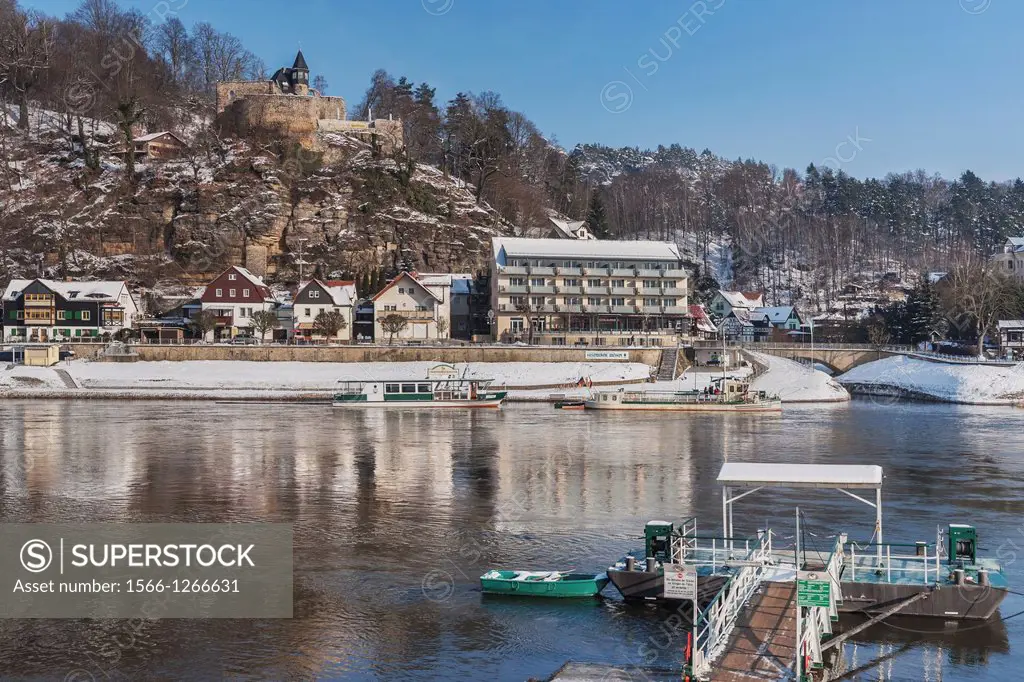 View over the Elbe river to the health resort Rathen (Lower Rathen) and the castle Altrathen. The castle is first mentioned 1289. The historic reactio...