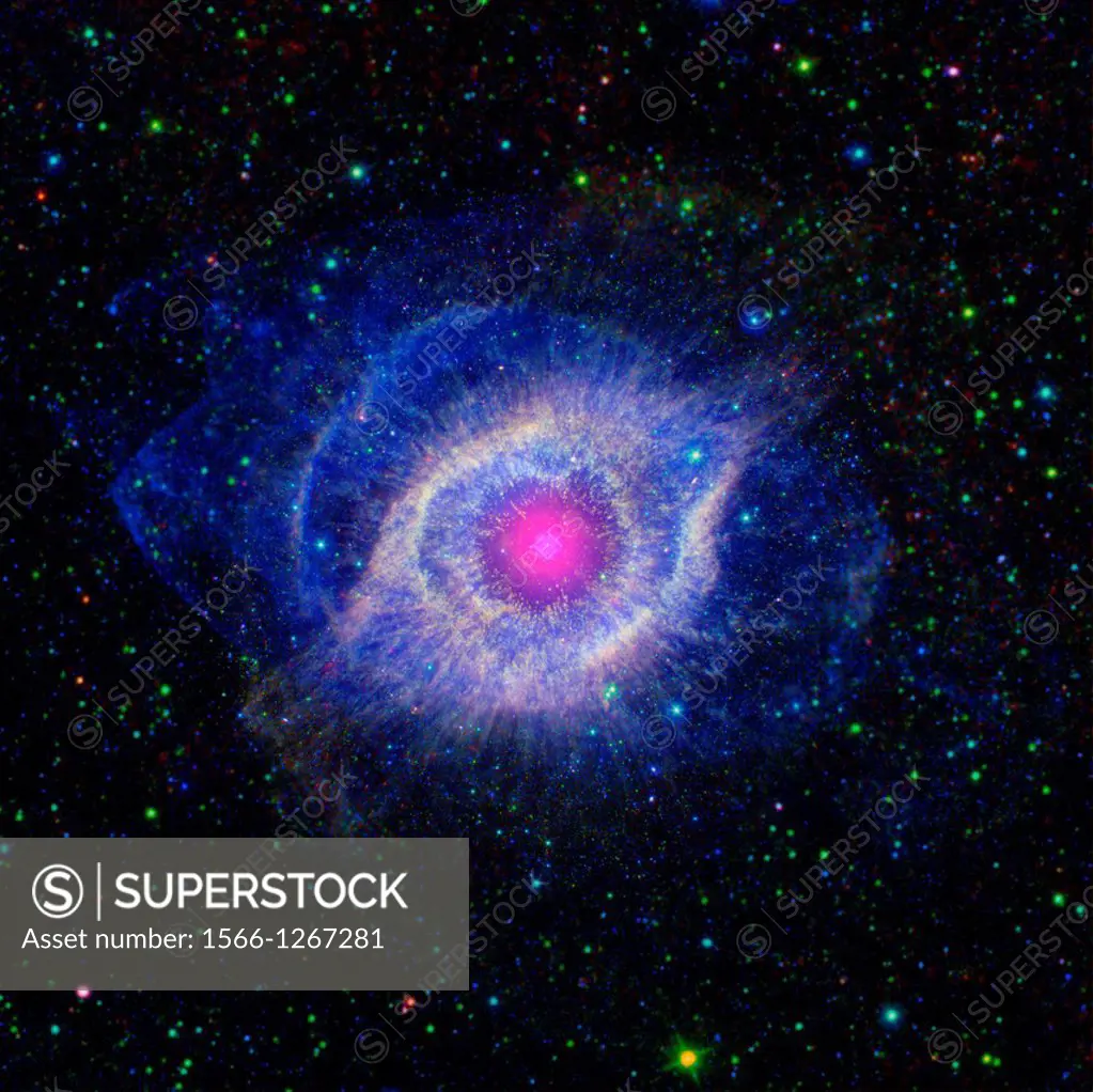 Helix Nebula - Unraveling at the Seams. A dying star is throwing a cosmic tantrum in this combined image from NASA's Spitzer Space Telescope and the G...