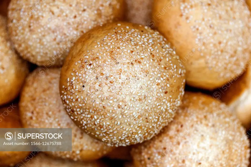 Bread buns with sesame seeds on top.