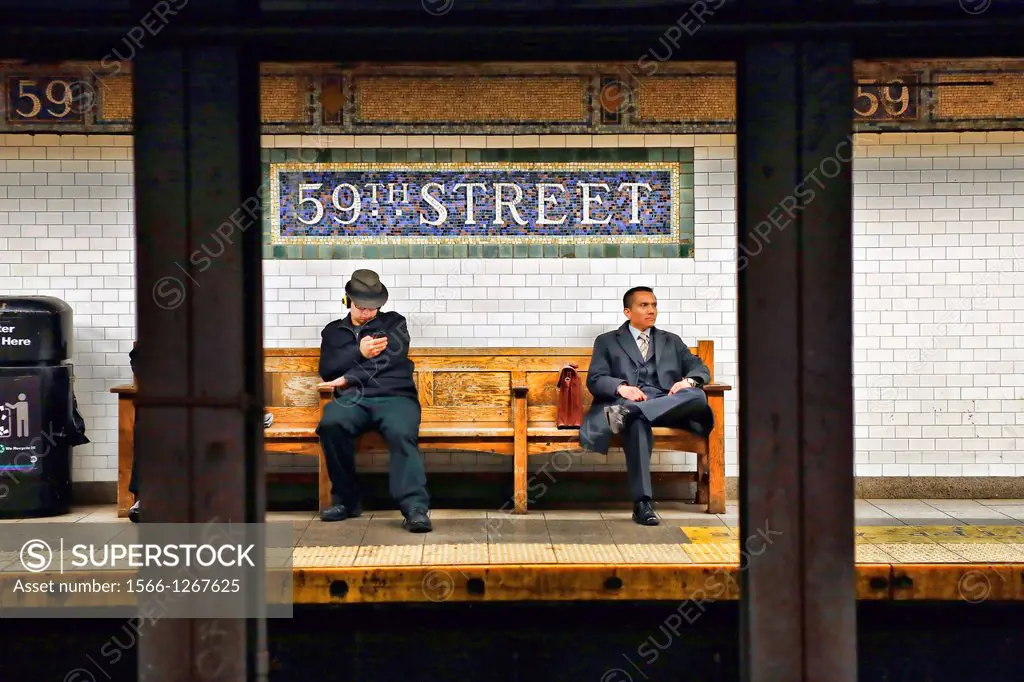 Two Men Seated on a Bench, waiting for a #6 Subway Train, 59th and Lexington Avenue Station, Manhattan, New York City