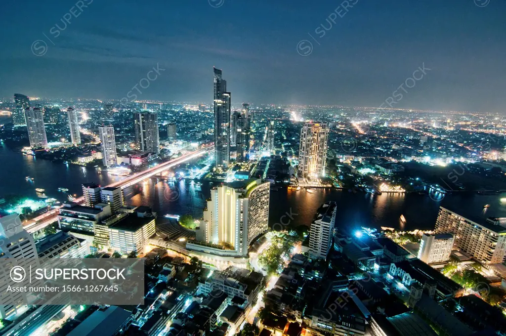 view of Bangkok and the Chao Phraya River by night, Thailand