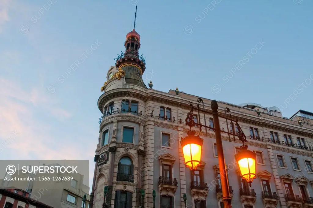 Facade of building at dawn. Alcala street, Madrid, Spain.