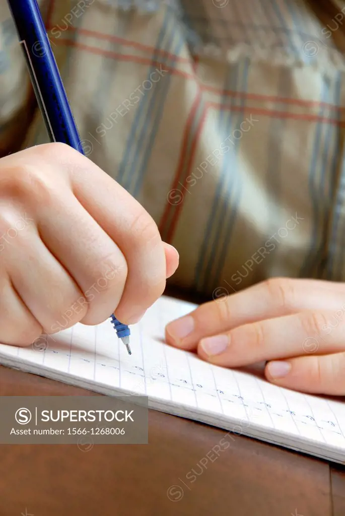 Young boy doing his homework