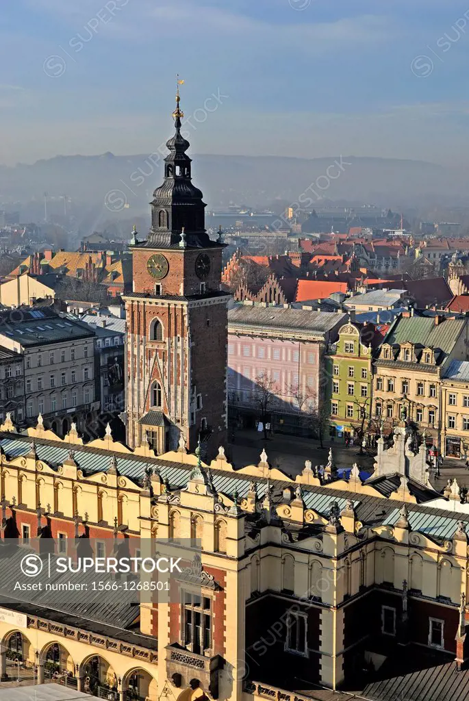 the Sukiennice Cloth Hall and the ancient City Hall´s Tower seen from the top of a tower of St. Mary´s Basilica, Krakow, Poland, Central Europe
