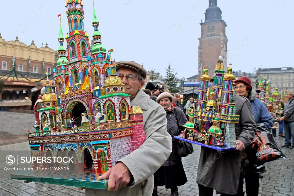 a competition and annual exhibition of Christmas cribs stand on the Main market square, Krakow, Poland, Central Europe