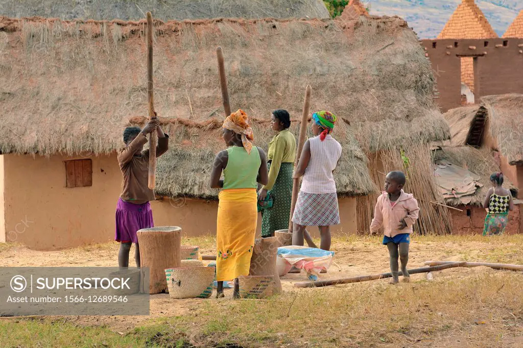 Women preparing food in a small village in Andringitra National Park, Madagascar