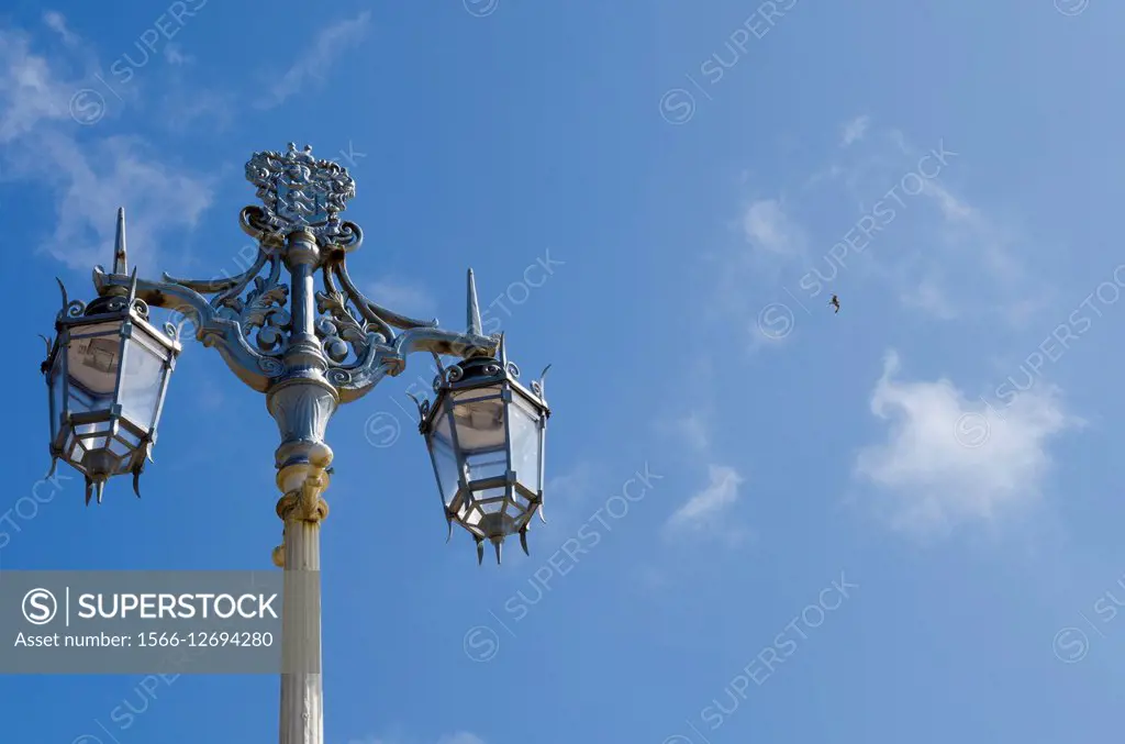 Ornate street lamp on the seafront of Brighton and Hove, East Sussex, England.
