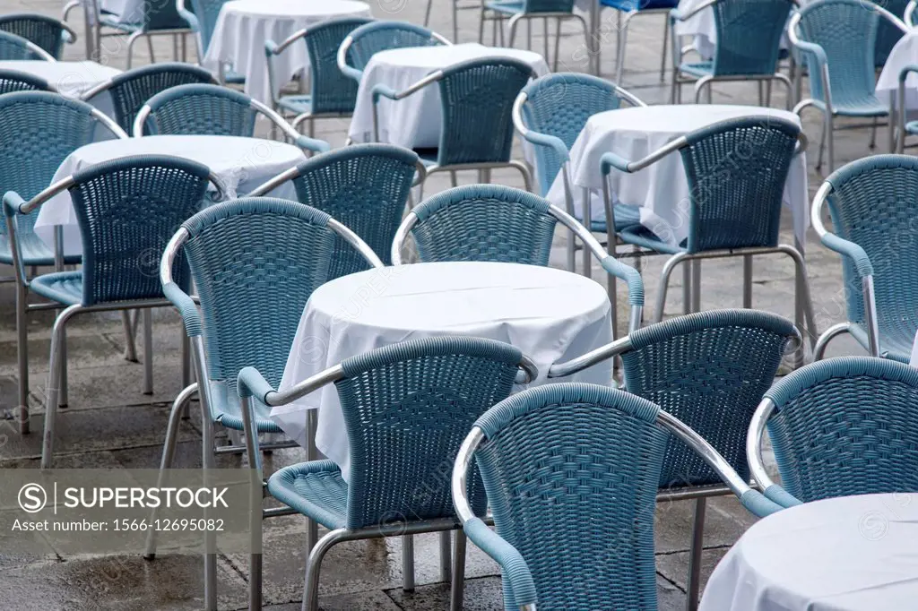 Cafe Tables and Chairs in San Marcos - St Marks Square; Venice; Italy.