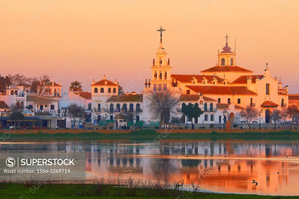 El Rocio village and Hermitage at Sunset, Almonte El Rocio, El Rocio Marismas de Doñana, Doñana National Park, Huelva province, Andalusia Spain
