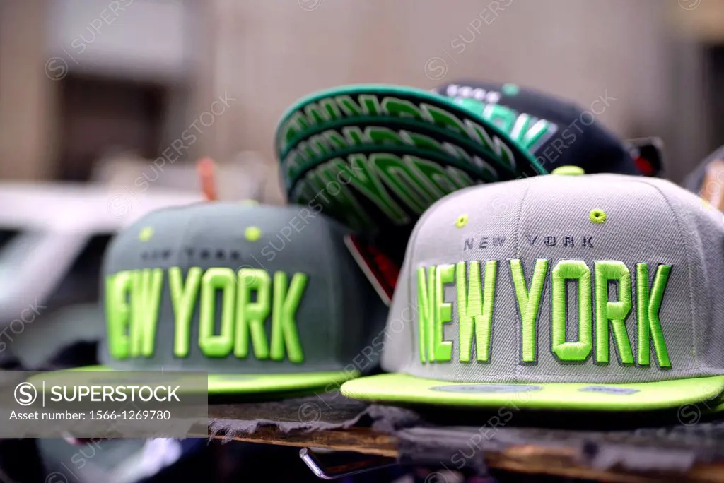 Street Vendor Cart, New York City, Featuring Baseball Caps for Sale. ""New York"" Embroidered on Front.