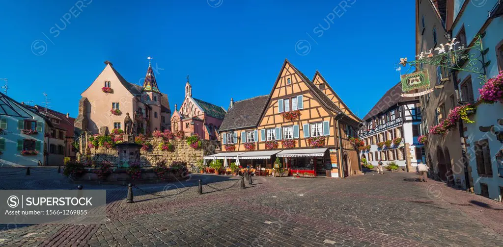 Market square and picturesque houses in Eguisheim, Alsace, France, Europe