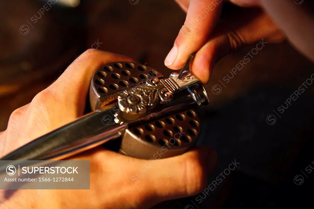 Worker in the workshop of the argentine silversmith Juan Carlos Pallarols in the San Telmo town, Buenos Aires, Argentina