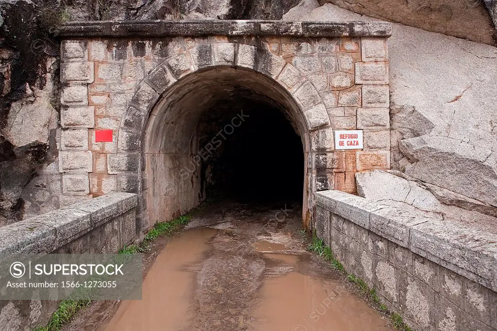 Jandula Reservoir, tunnel excavated in the mountain of granite and slate in the reservoir of Jandula, Jaen, Spain