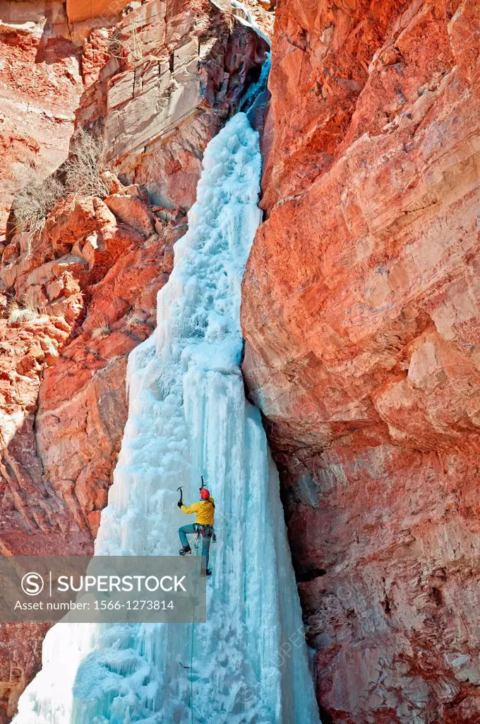 Ice climbing Cornet Falls which is rated WI-4 and located in the San Jaun Mountains near the city of Telluride in southwestern Colorado.