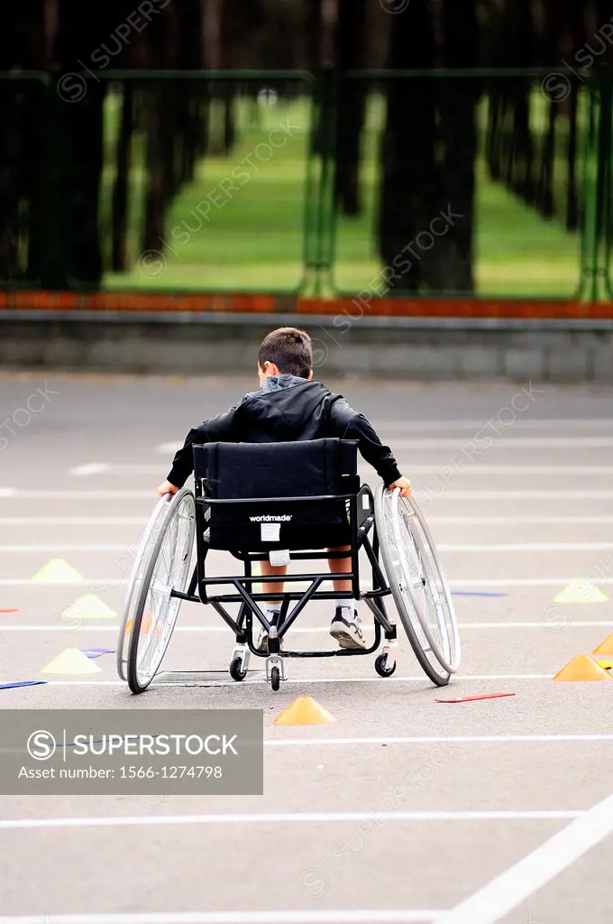 Boy in wheelchair, circuit practice