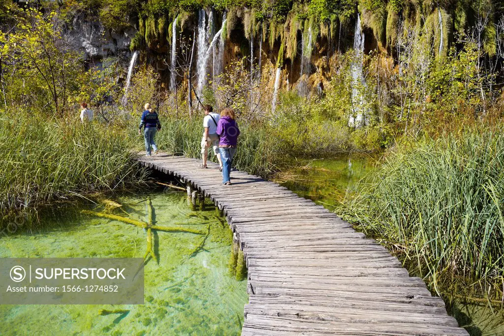 Croatia - Plitvice Lakes National Park, tourist on the wooden paths, central Croatia.