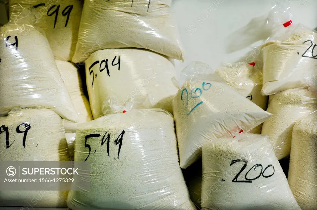 wheat semolina bags piled up in a grocery store