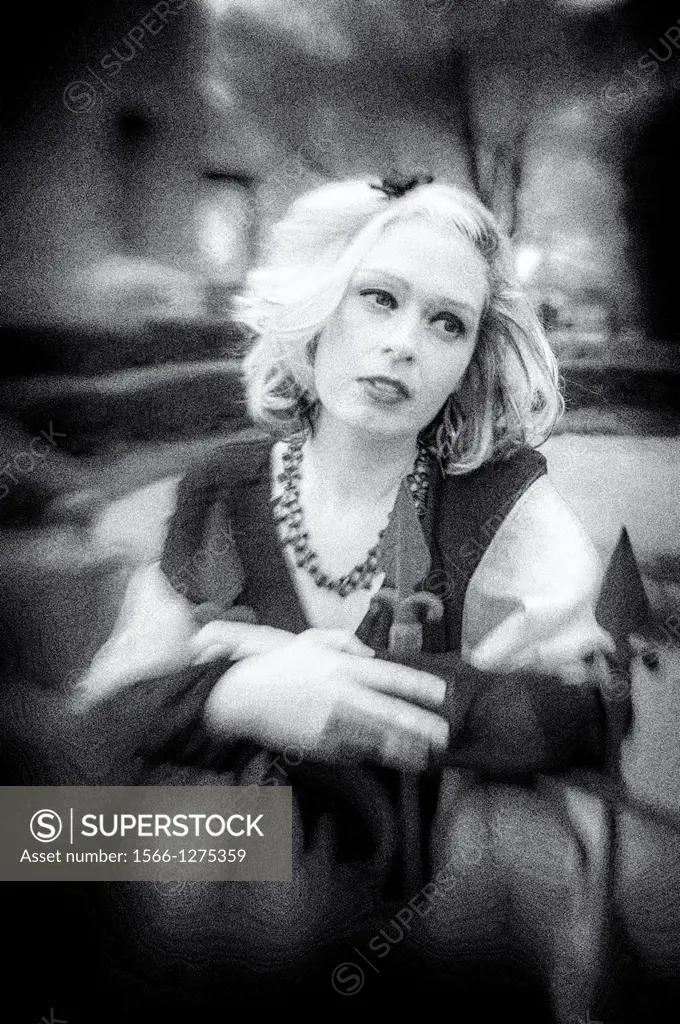 Black & white portrait of a 34 year old blond woman looking away from the camera.