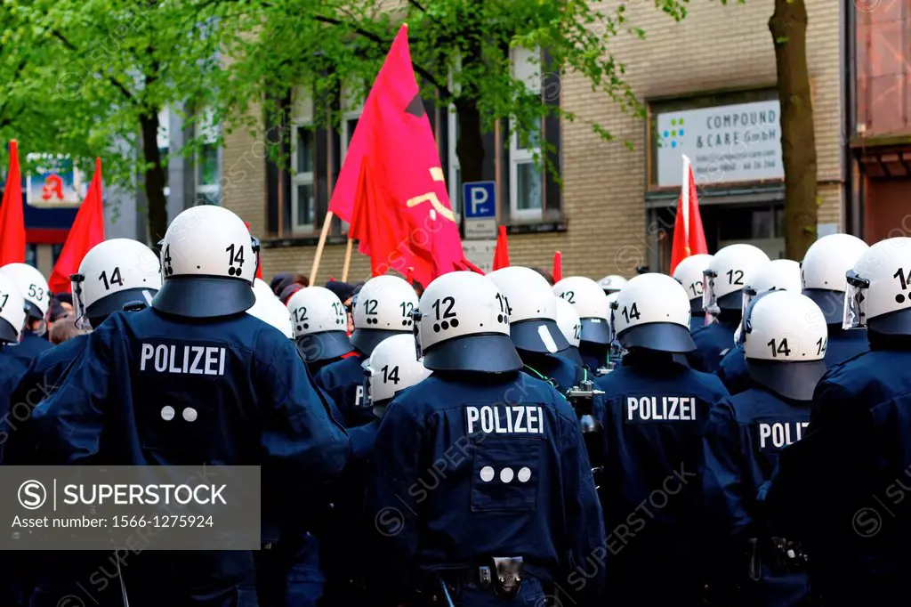 German Police forms a line in front of the protesters at the Mayday demonstration in Hamburg, Germany on May 1, 2012.