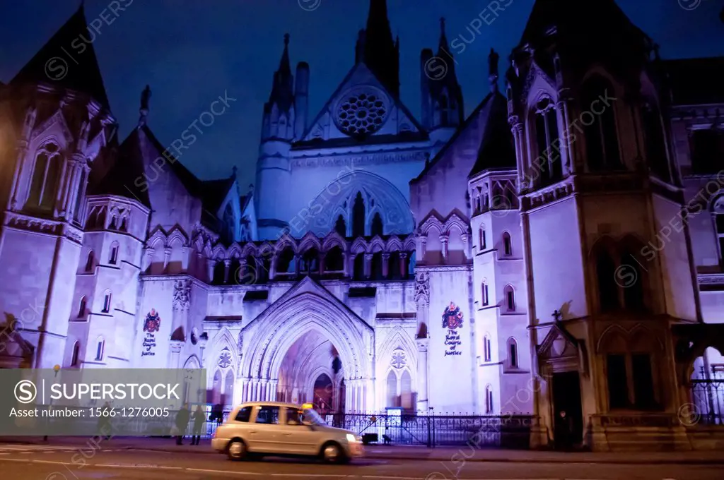 The Royal Courts of Justice at night, London, UK.