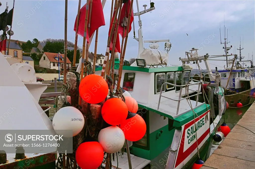 Fishing harbour at Arromanches-les-Bains (or, simply Arromanches) is a commune in the Calvados department in the Basse-Normandie region in north-weste...