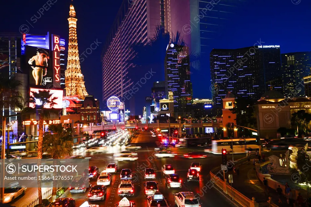 traffic at night on The Strip, Las Vegas Boulevard South, and a reflection of a hotel