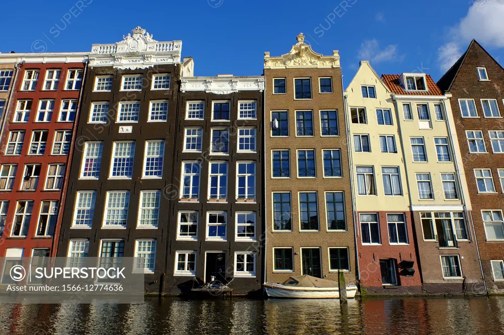 Old buildings overlooking the Damrak, Amsterdam, The Netherlands, Europe