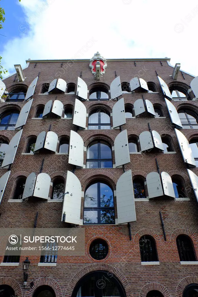 Old converted canal warehouse buildings, Amsterdam, The Netherlands, Europe