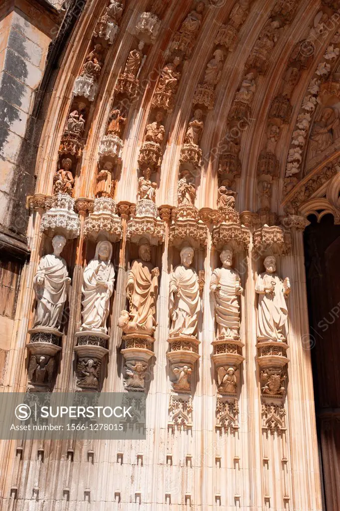 Portal by Huguet & statues of the apostles in intricate late Gothic style, Batalha Portugal