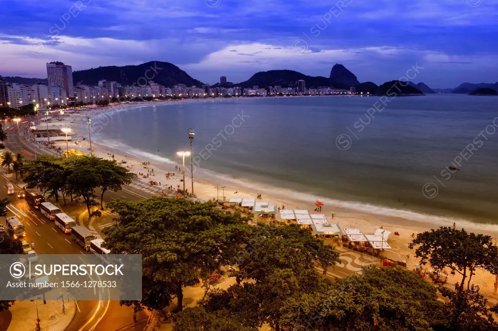 Copacabana and Pao de Açucar (Sugar Loaf) at night, Rio de Janeiro, Brazil.