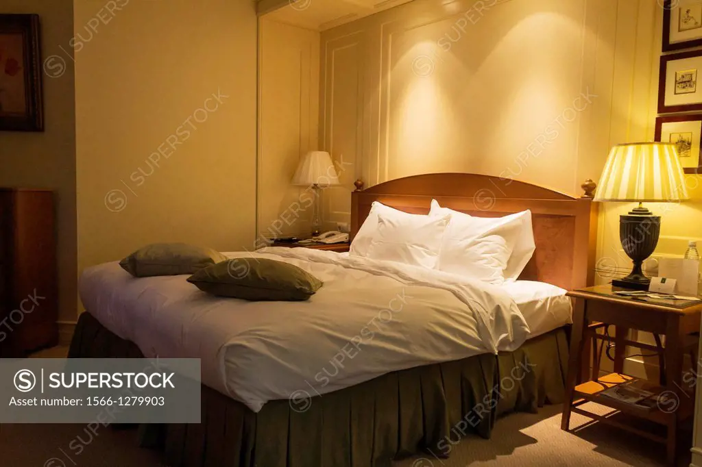 Double bed in the modern interior room.