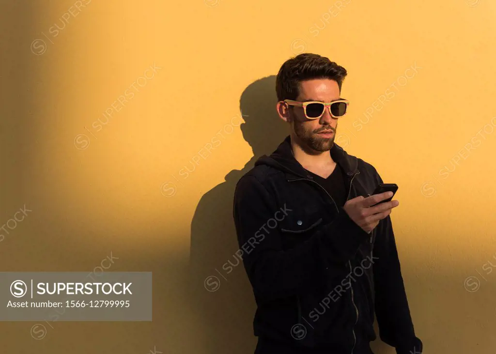 Man using iphone.