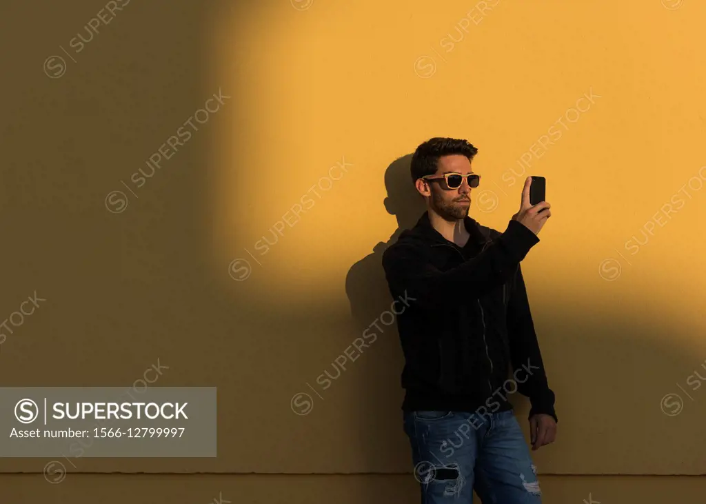 Man using iphone.