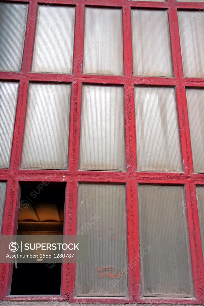 window, industrial enclosure Can Batllo, Barcelona, Catalonia, Spain.