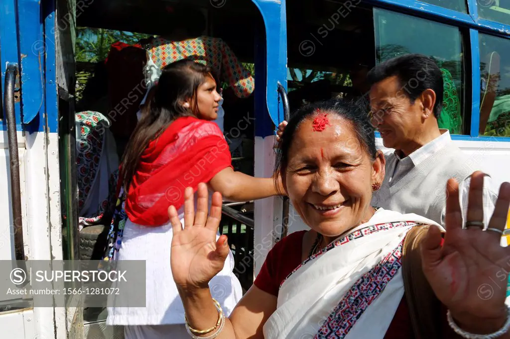 Nepal, City of Pokhara, women going to a private wedding ceremony