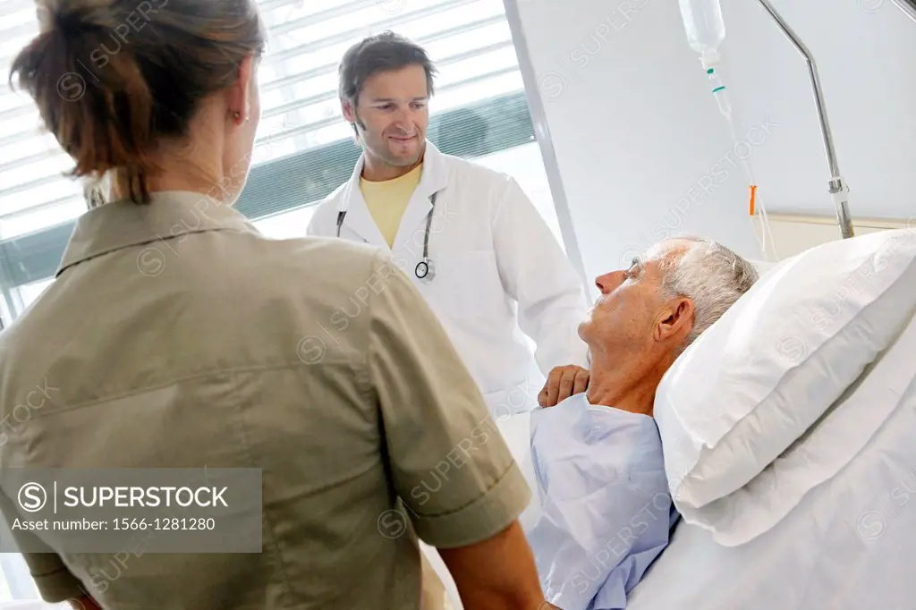 doctor attending to patient in hospital room, Onkologikoa Hospital, Oncology Institute, Case Center for prevention, diagnosis and treatment of cancer,...