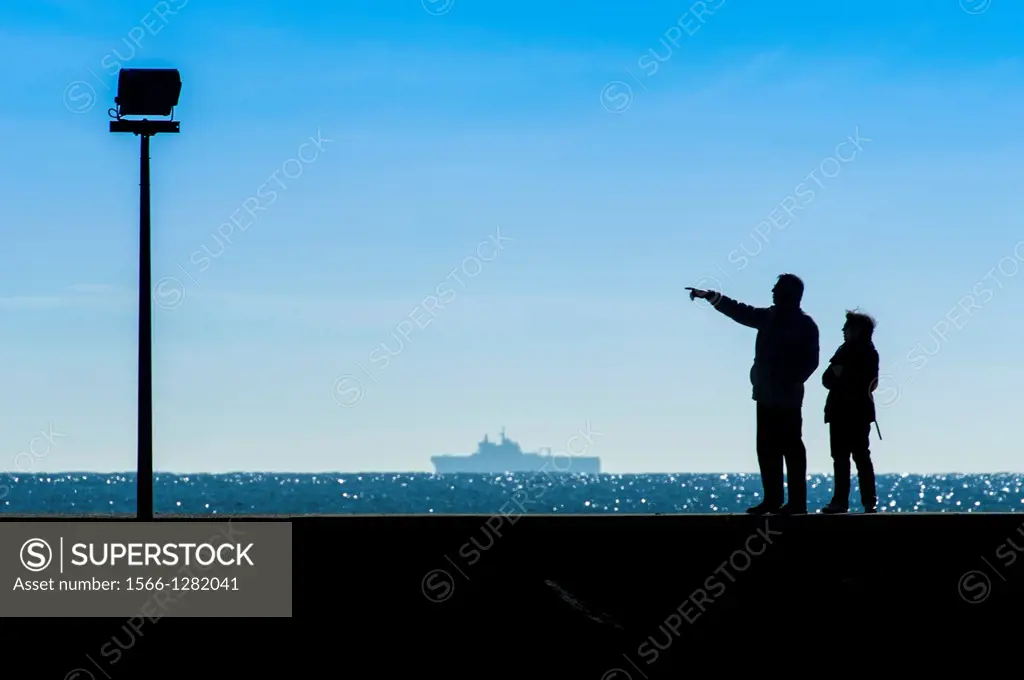 Europe, France, Var, Giens Peninsula. Couple of Tourists on the dock.