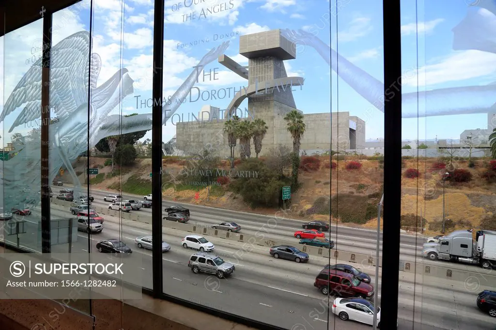 The view of U.S. Route 101 from the glass wall of the courtyard of Cathedral of Our Lady of the Angels. Los Angeles. California. USA.